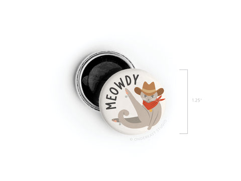 The Meowdy Button Magnet by Onderkast Studio features a 1.25 round cat in a cowboy design with a red bandana, raised paw, and MEOWDY above. Perfect for cat lovers!.