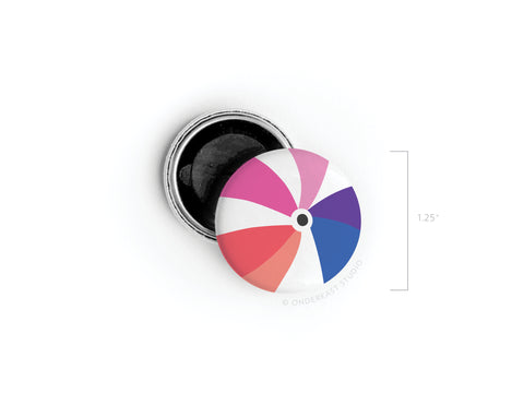 The Onderkast Studio Beachball Button Magnet features a vibrant pink, purple, red, and white beach ball design on a 1.25-inch round magnet, shown clearly on a white background for an eye-catching display.