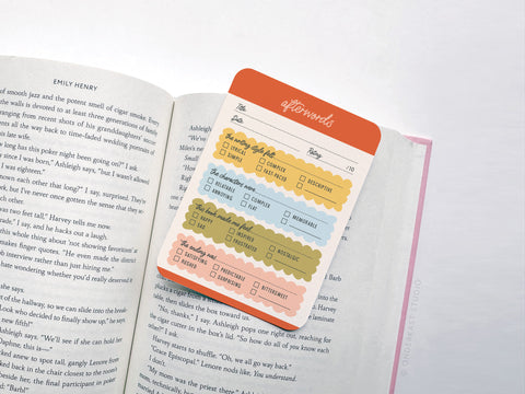 The Afterwords Book Review Card Set by Onderkast Studio features vibrantly printed cards on premium cardstock with checkboxes for date, rating, and thoughts—organized into sections for tracking multiple books read.