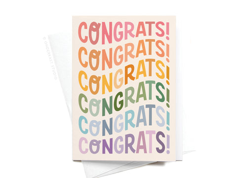 The Onderkast Studio Congrats Wonky Type Folded Greeting Note Set of 10 features cards with CONGRATS! repeated in large, wavy letters in pink, orange, yellow, green, blue, and purple. Includes envelopes for a premium touch.