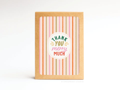 The Onderkast Studio Thank You Merry Much Folded Greeting Note Set of 10 features colorful vertical stripes with Thank you very much in green, yellow, and pink, framed in brown kraft paper for a premium touch. Printed in the USA.