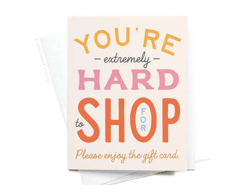 The You’re Hard to Shop For Greeting Card by Onderkast Studio features colorful orange, pink, black, and blue text on a white background—perfect for thoughtful gift-giving.