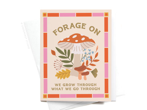 The Forage On Mushroom Greeting Card by Onderkast Studio features colorful borders, charming mushroom, leaf, and flower illustrations, and reads “FORAGE ON” at the top and “WE GROW THROUGH WHAT WE GO THROUGH” at the bottom for a premium touch.