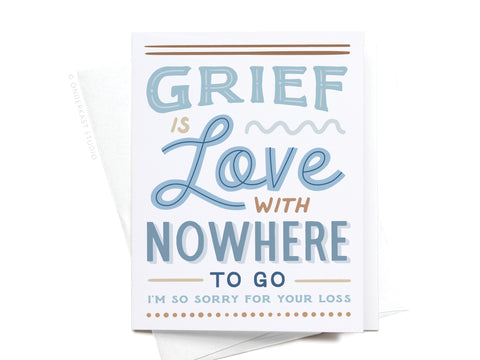 The Onderkast Studio Grief Is Love With Nowhere to Go Greeting Card features a heartfelt sympathy message in blue and brown on white, with a partially visible envelope behind the card.