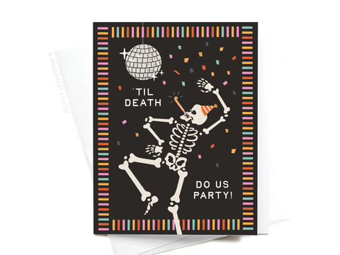 The Til Death Do Us Party Greeting Card by Onderkast Studio features a skeleton in a party hat dancing under a disco ball with confetti. TIL DEATH DO US PARTY! appears on a black background with a multicolored border.