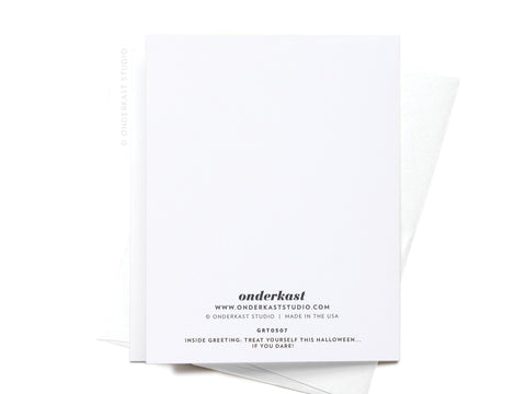 The Beware of the Lurking Dental Bill Halloween card by Onderkast Studio sits atop a matching envelope. The back features the brands logo and hints at a spooky inside message.