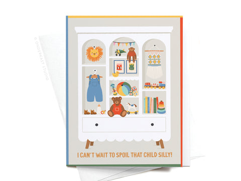 Onderkast Studio’s “I Can’t Wait To Spoil That Child Silly Greeting Card” features a white cabinet brimming with colorful baby toys, books, clothes, and decorations—perfect for sending a unique and premium greeting!.