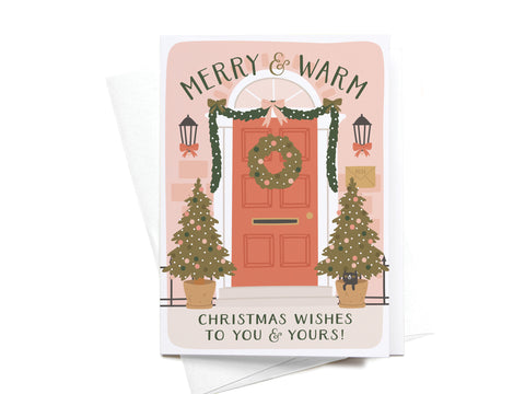 The Merry & Warm Christmas Wishes Folded Greeting Note Set of 10 by Onderkast Studio features a premium red door design with festive accents. Made in the USA, these cards read: Merry & Warm and Christmas wishes to you & yours!.