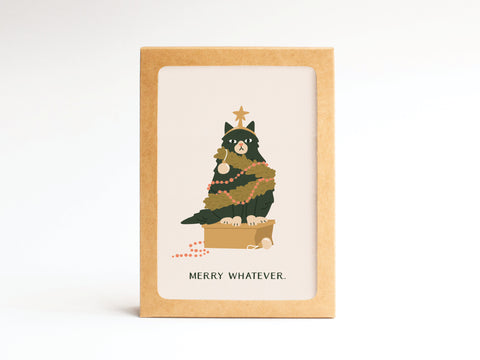 The Merry Whatever Cat Folded Greeting Note Set of 10 by Onderkast Studio features a grumpy cat tangled in holiday lights and garlands with the text “MERRY WHATEVER” on a premium, vibrantly printed card.