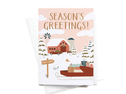 The Seasons Greeting! Tree Farm Folded Greeting Note Set of 10 by Onderkast Studio features a red barn, snowy trees, and a gift-filled truck with sleigh on premium US card stock. Seasons Greetings! tops the card—perfect holiday notes.