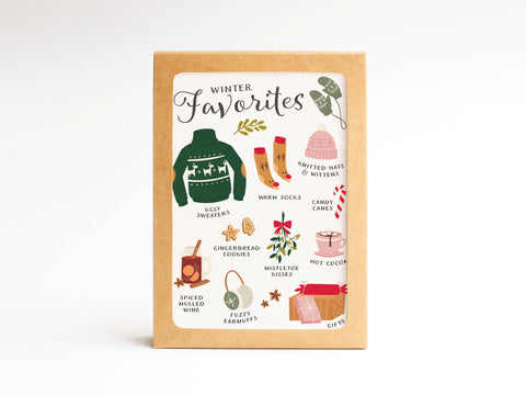 The Winter Favorites Folded Greeting Note Set of 10 by Onderkast Studio features vibrant illustrations—sweaters, mittens, candy canes, and more on a brown background—perfect as high-quality seasonal cards.