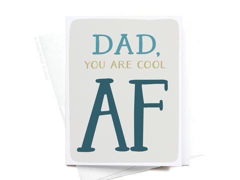 The Onderkast Studio “Dad, You Are Cool AF Greeting Card” features bold blue and gold lettering on a light background, cool dad vibes, and comes with a white envelope—perfect for Father’s Day.