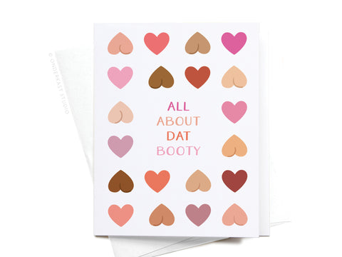 The All About Dat Booty Greeting Card by Onderkast Studio features rows of heart-shaped designs in diverse skin tones and colorful ALL ABOUT DAT BOOTY text, displayed on a white envelope.