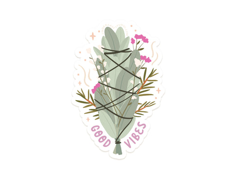 The Good Vibes Smudge Stick Sticker by Onderkast Studio features a sage bundle with pink and white flowers tied with black string, GOOD VIBES in pink below, and subtle sparkles. Made of durable, water-resistant vinyl.