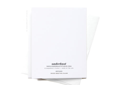 A blank white Rise & Wine Greeting Card – FINAL STOCK by Onderkast Studio with product details in black at the bottom center, placed on a white envelope against a white background.