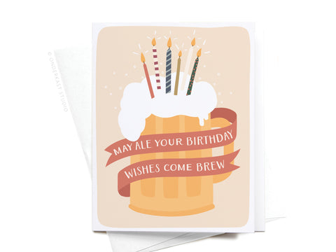 A festive greeting card featuring a frosty beer mug with candles on top and the caption 'May Ale Your Birthday Wishes Come Brew,' exuding a celebratory atmosphere and joyful sentiment.